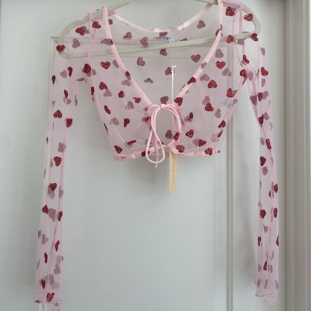 Cropped pink shear tie up long sleeve top with red glitter hearts
